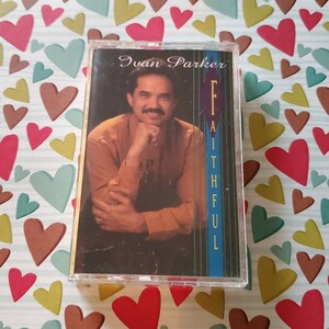 May include: A cassette tape with a photo of Ivan Parker on the cover. The title of the album is "Faithful".