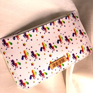 Stylish unicorn wallet made of vinyl with a magnetic closure