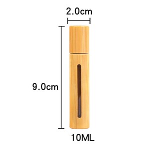May include: A light brown bamboo bottle with a removable cap. The bottle is 9.0 cm tall and 2.0 cm wide, with a 10 ml capacity. The bottle has a vertical window to view the contents.