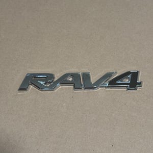 Toyota RAV4 Rear Liftgate Emblem Badge – Chrome & Black