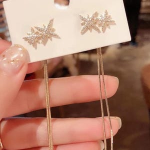 Star Tassel Drop Earrings: Gold Celestial Cubic Zirconia Studs