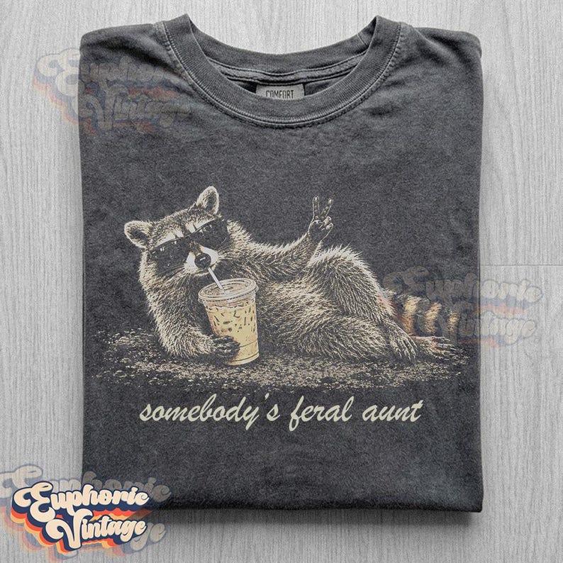 Funny Somebody's Feral Aunt Raccoon T-Shirt, Iced Coffee Raccoon Tee, Sarcastic Auntie Gift, Retro Trash Panda Graphic Pepper
