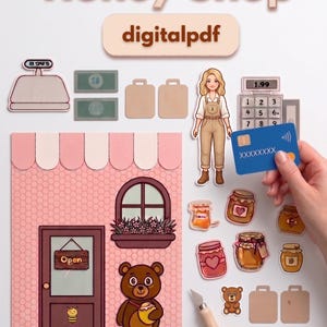 Peut inclure: Ensemble de découpes en papier pour une boutique de miel, comprenant une façade de magasin, un ours, des pots de miel, une caisse enregistreuse, de l'argent, une carte de crédit et une personne. Le texte "Honey Shop" et "digitalpdf" sont présents.
