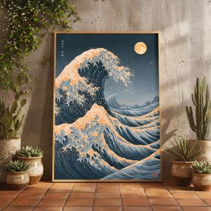 May include: A rectangular wall art print featuring a stylized ocean wave scene at night. The artwork displays deep blue water with golden-toned highlights on the crests, a bright full moon in the dark sky, and subtle vertical Japanese text.