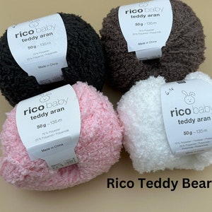 May include: Four balls of Rico Baby Teddy Aran yarn in black, brown, pink, and white. Each ball is 50 grams and 135 meters long. The yarn is made in China.