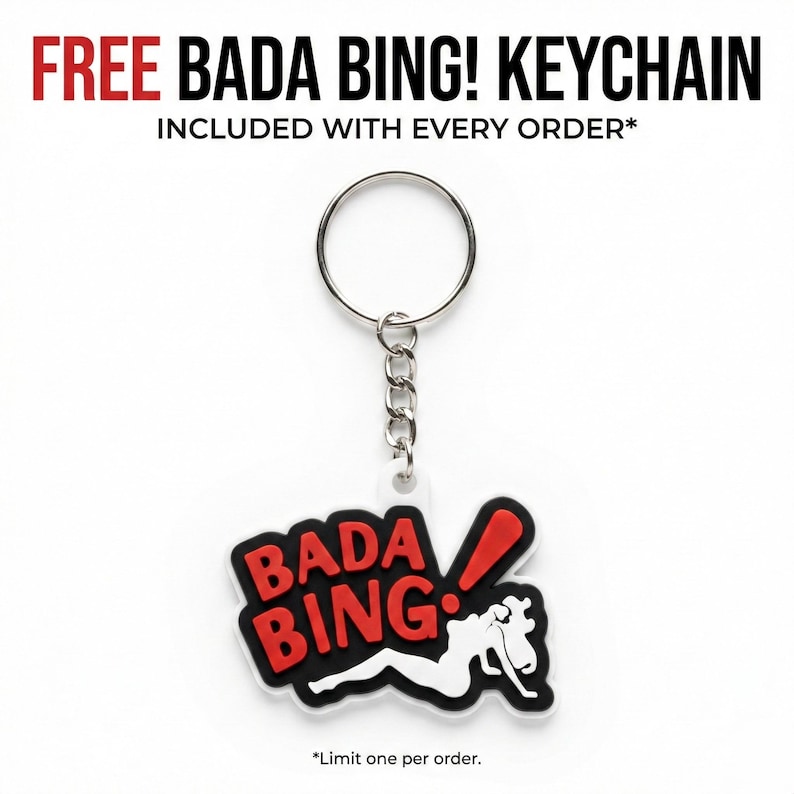 A promotional graphic showing a white keychain with the red and black Bada Bing logo, with text stating a free keychain is included with every order.