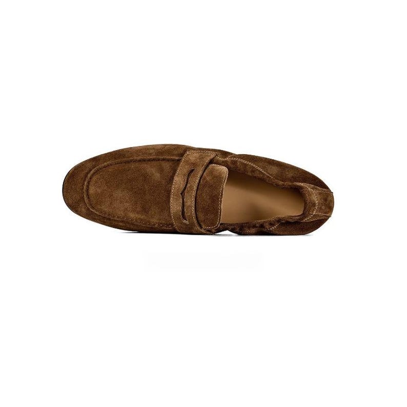 May include: A brown suede loafer shoe featuring a classic penny slot strap across the vamp. The shoe has a rounded toe, visible stitching along the edges, and a tan interior lining, presented from a top-down perspective against a white background.