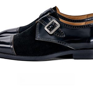 Black leather dress shoe back heel view monk strap