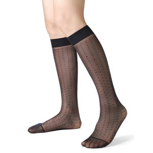 May include: Black sheer knee-high socks with a polka dot pattern. The socks have a solid black band at the top. The socks are semi-transparent and the polka dots are evenly spaced. The socks are worn on a person's legs.