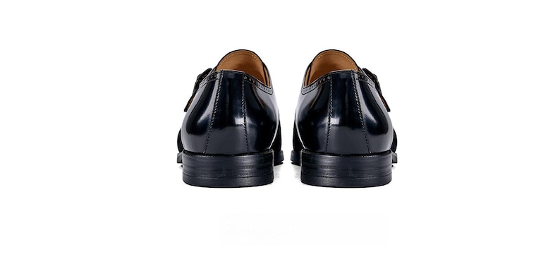 Handmade monk strap shoes pair angled view rubber sole