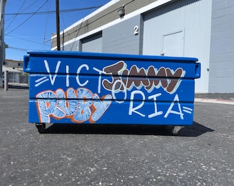 concrete dumpster graffiti flower pot