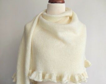 handknit cream shawl with ruffle and shimmering metallic thread