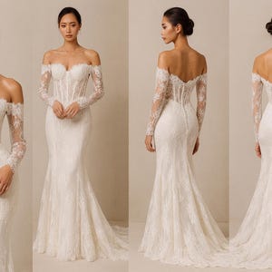 May include: Off-the-shoulder white lace wedding dress with long sleeves. The bodice has a corset-like structure, and the skirt flares out from the knees. The dress features delicate lace detailing throughout, creating an elegant and romantic look.
