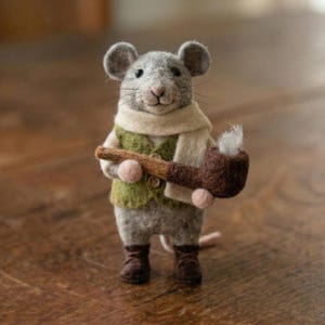 May include: A white ceramic mug with a black handle and the text "But First, Coffee" in a handwritten style. The mug is likely 11-15 ounces, perfect for a morning beverage.