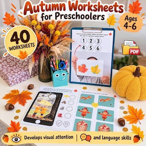 May include: A set of autumn-themed educational worksheets for preschoolers, featuring printed activities with numbers, matching tasks, and seasonal illustrations. The collection includes a clipboard, a pencil holder, and decorative fall elements.