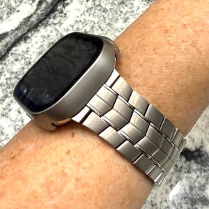 Titanium color pc Case and or Apple watch Band in Titanium color. Stainless steel Apple Watch Ultra band and or Apple Watch cover 44,45,49