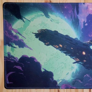May include: A mousepad featuring a space scene with a large spaceship, a planet, and purple and green clouds. The spaceship is dark with illuminated windows. The background has a gradient of purple and blue colors.
