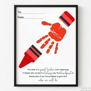 May include: Framed print with a red handprint design resembling a crayon. The print includes the text "To:" and "From:" at the top, and a poem about teachers and handprints at the bottom. The frame is black.