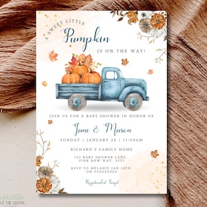 May include: Baby shower invitation with a watercolour design. The invitation features a blue truck carrying pumpkins, with text that reads "A Sweet Little Pumpkin is on the Way!" and details for Jane & Mason's baby shower.