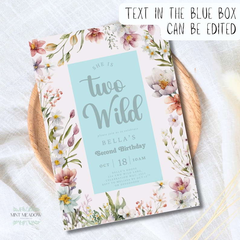 May include: A floral-themed invitation with the text "She is Two Wild" in a light blue box. The invitation is surrounded by watercolor flowers in shades of pink, white, and green. The text also includes "Bella's Second Birthday".