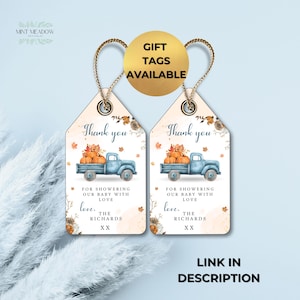 May include: Two rectangular gift tags with gold string loops featuring a watercolor illustration of a blue pickup truck carrying orange pumpkins. The text reads Thank you, FOR SHOWERING OUR BABY WITH LOVE, love, THE RICHARDS, XX, and GIFT TAGS AVAILABLE.