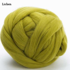 May include: A large ball of green wool roving, perfect for felting or spinning.