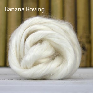 May include: A close-up of a white, fluffy, natural fibre roving, called "Banana Roving".