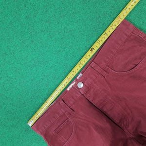 May include: A rustic wooden sign with the text "Welcome to our home" in white lettering. The sign features a distressed finish and a simple, inviting design, perfect for entryway decor.