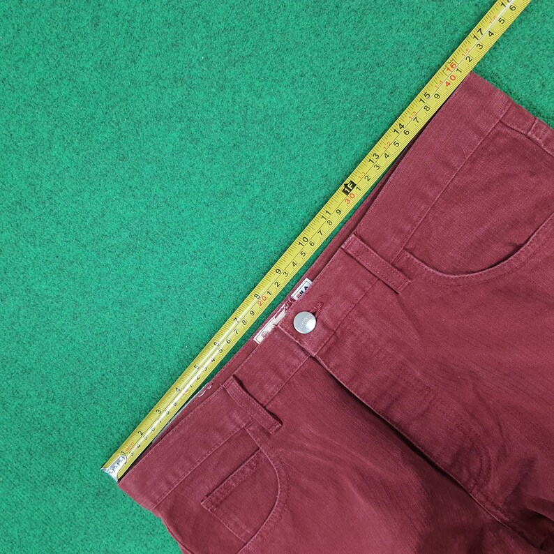 May include: A rustic wooden sign with the text "Welcome to our home" in white lettering. The sign features a distressed finish and a simple, inviting design, perfect for entryway decor.