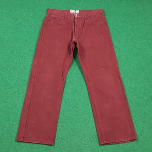 May include: A rustic wooden sign with the text "Welcome to our home" in a handwritten style. The sign is rectangular, with a distressed finish, and features a simple, inviting design. It's suitable for indoor or outdoor use.