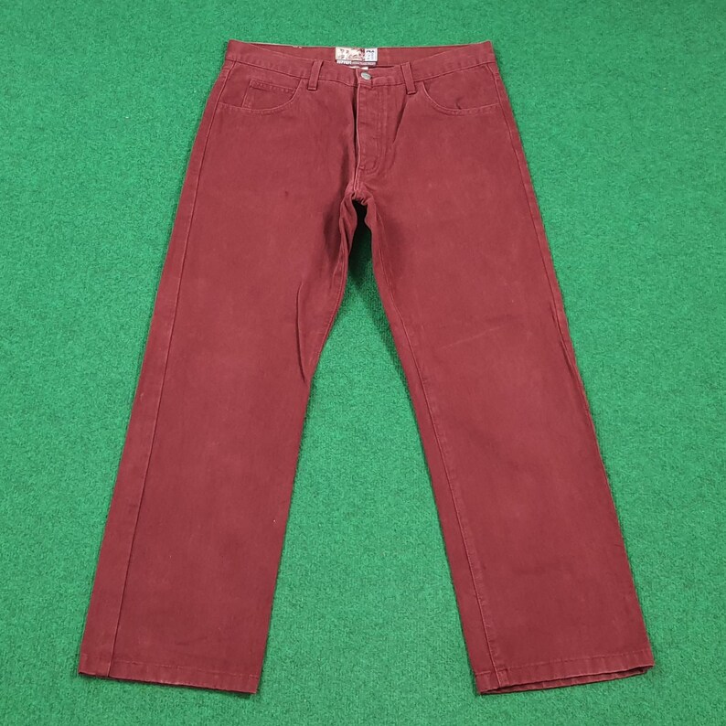 May include: A rustic wooden sign with the text "Welcome to our home" in a handwritten style. The sign is rectangular, with a distressed finish, and features a simple, inviting design. It's suitable for indoor or outdoor use.