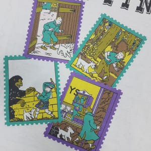May include: Four colorful postage stamps featuring illustrations of a cartoon character and a white dog. The stamps have purple and green borders. The illustrations depict various scenes, including a character in a green coat and a dog.