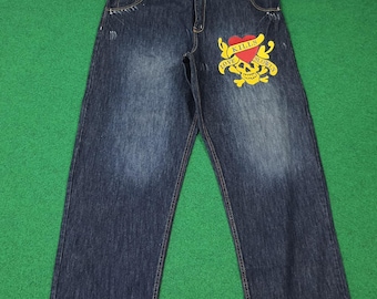 Vaqueros vintage con logotipo personalizado bordado de calavera de Ed Hardy