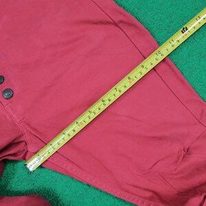 May include: A rustic wooden sign with the text "Welcome to our home" in white lettering. The sign features a distressed finish and a simple, inviting design, perfect for entryway decor.