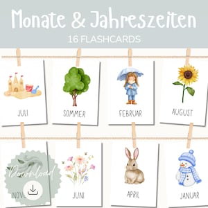 Könnte beinhalten: Ein Set aus 16 Lernkarten mit Aquarellillustrationen zu saisonalen Themen. Die Karten sind mit Wäscheklammern an einer Schnur befestigt. Die Karten zeigen Bilder von einer Sandburg, einem Baum, einem Mädchen mit Regenschirm, einer Sonnenblume, Blumen, einem Kaninchen und einem Schneemann.