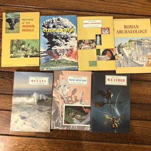 May include: A collection of six vintage paperback books with colorful covers featuring images of animals, volcanoes, medical discoveries, Roman archaeology, oceans, crime detection, and weather. The books are all part of a science program.
