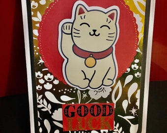 Red, gold and black good luck card with cat