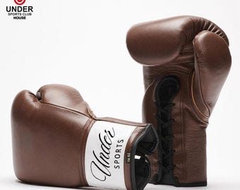 Guantoni da boxe in pelle: attrezzatura resistente per allenamento e sparring