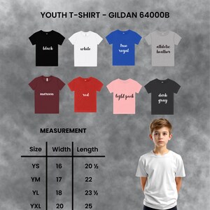 May include: A range of youth t-shirts in colours such as black, white, and red. The image shows the Gildan 64000B model, with a measurement chart detailing sizes and dimensions. The width measurements range from 40.6 cm to 50.8 cm.