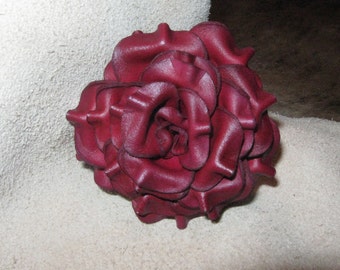 Full size sculpted red leather rose