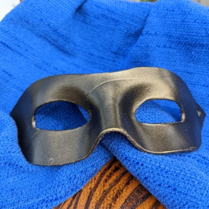 Black metallic leather superhero mask