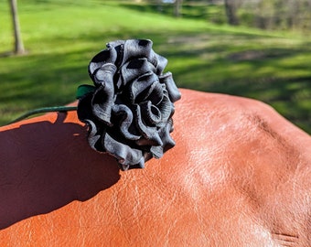 Sculpted black leather rose