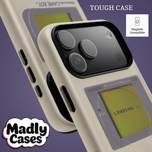 Personalized retro handheld gaming phone case with custom name, MagSafe compatible, displayed on dark wooden table, colorful pixel art design inspired by 80s and 90s arcade games