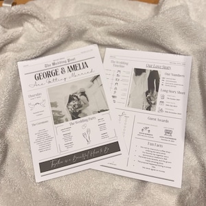 May include: Two wedding newspaper printouts with the headline "GEORGE & AMELIA Are Getting Married." The prints include wedding details, photos, and the phrase "Together is a Beautiful Place to Be."