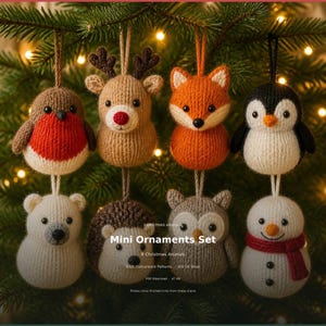 May include: A set of eight knitted animal ornaments including a robin, reindeer, fox, penguin, polar bear, hedgehog, owl, and snowman. The text reads Mini Ornaments Set, 8 Christmas Animals, 8 DK Colourwork Patterns, JAS UK Shop, PDF Download, and Photos show finished knits from these charts.