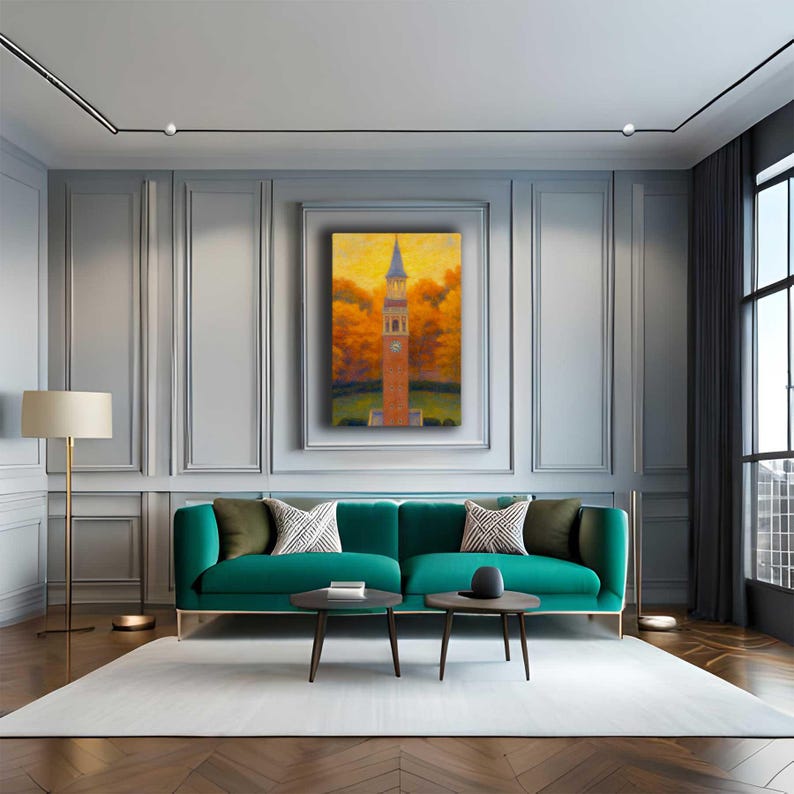 May include: An interior design scene featuring a teal sofa, two small round coffee tables, and a framed painting of a clock tower. The painting has a warm color palette with orange and yellow hues. The room has a modern aesthetic with a neutral color scheme.