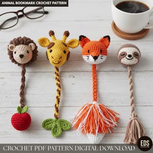 May include: Four handmade crochet animal bookmarks featuring a hedgehog with a red apple, a giraffe with green leaves, a fox with an orange tail, and a sloth with a tassel. The text ANIMAL BOOKMARK CROCHET PATTERN and CROCHET PDF PATTERN DIGITAL DOWNLOAD is visible.