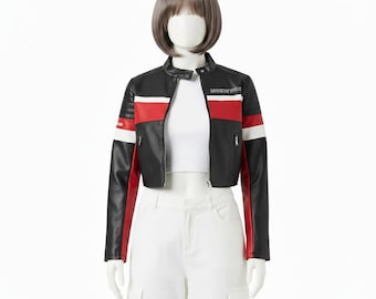 May include: Cropped black motorcycle jacket with red and white racing stripes. The jacket has a stand-up collar and a zip closure. The text "RACING STYLE" is printed on the chest. The jacket is worn with white trousers.