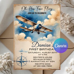 May include: Vintage-style invitation with a watercolor illustration of a biplane flying through a cloudy sky. The text reads "Oh, How Time Flies" and announces "Damian's First Birthday" with date, time, and location details. A compass rose is at the bottom.