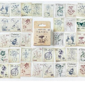 May include: A collection of vintage-style paper stamps with botanical and animal illustrations. The stamps feature images of mushrooms, butterflies, squirrels, and flowers in muted colors. A small box of stamps is in the center.